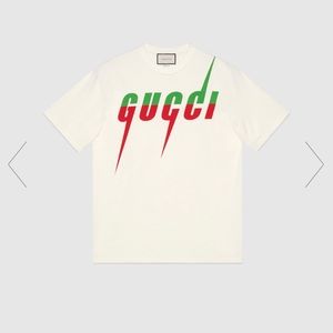 Gucci tee shirt with Gucci blade print. Size: Medium. Color: white/red/green.